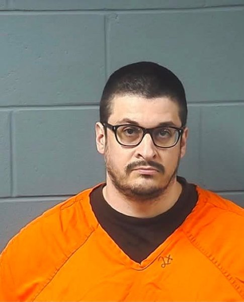 Booking photo — Michael G. Thompson