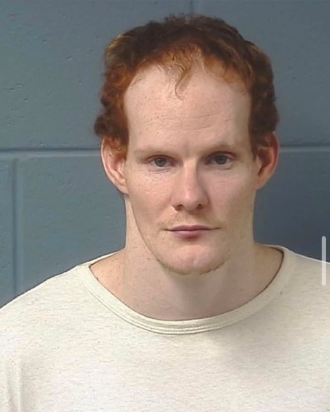 Booking photo — Michael J. Frank