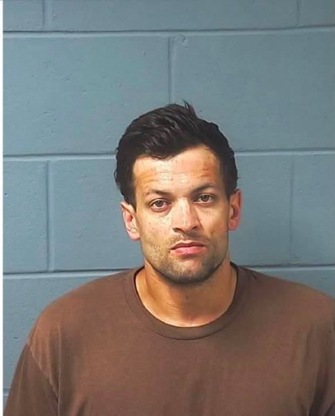 Booking photo — Austin J. Weeks