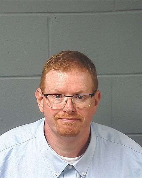 Booking photo — Brandon J. Adolphson